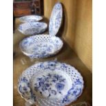 Five Meissen cabinet ribbon plates with blue floral decoration, having blue cross marks to base