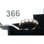 A five stone dress ring in 9ct gold setting