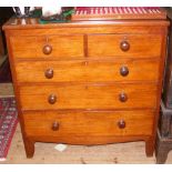 An antique chest of two short and three long drawers