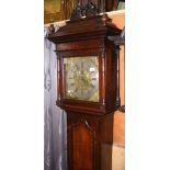 A 19th century oak cased eight day Grandfather clock, having square brass dial with silver chapter