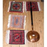 Antique bed warming pan, together with four Middle Eastern style prayer rugs