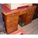 Antique mahogany pedestal desk with nine drawers to the front