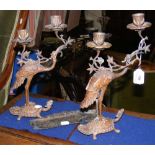 A pair of decorative antique bronze candlesticks in the oriental style - 32cm high, together with an