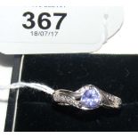 A tanzanite and diamond ring in 9ct gold setting