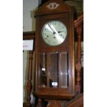 Oak cased chiming wall clock