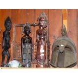Carved African figures, repro Roman helmet, etc.