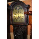 Early 19th century carved oak eight day Grandfather clock, having brass arched dial with rolling