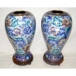 A pair of Chinese cloisonne baluster vases with blue floral design on carved wood bases - 41cm