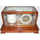 A mahogany cased brass barograph labelled Benzie, Cowes - 36cm