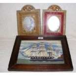 A 19th century wool work three masted ship, together with a pair of "HMS Juno" oval mirrors in