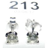 A pair of 18ct white gold diamond Solitaire stud earrings - .7 carat