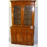 A Victorian bookcase with glazed upper section and drawers and cupboards below - 120cm x 220cm