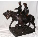 A bronze group of two huntsmen, one with hunting horn, on rectangular base - 52cm high overall