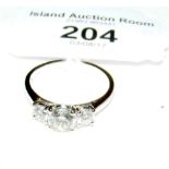 An 18ct white gold three stone diamond ring - 1.1 carat total diamond weight