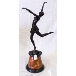 A 49cm bronze figure of an art deco dancing lady on marble plinth