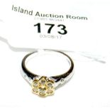 An 18ct white gold floret diamond cluster ring - .5 carat