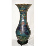A large Japanese cloisonne vase with bird, flower and fruit decoration on wooden base - 67cm high