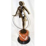 An Art Deco style bronze figure of a hoop dancer on marble base - 47cm high overall