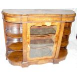 A Victorian inlaid walnut credenza enclosed by glazed centre door