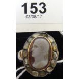 An unhallmarked yellow metal Georgian oval cameo ring