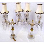 A pair of ormolu mounted cut crystal two-branch table lamps converted to electricity