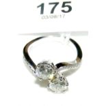 An 18ct white gold two stone diamond crossover ring - total diamond weight 1.6 carat