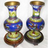 A pair of Chinese cloisonne vases with five claw dragon chasing a flaming perle in yellow and blue