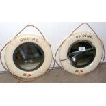 Pair of 16cm diameter "Lifebuoy" framed bevelled wall mirrors described "Undine" bearing Island