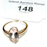 A 9ct gold Morganite teardrop shaped Solitaire ring