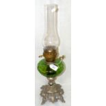 A French oil lamp with green glass reservoir