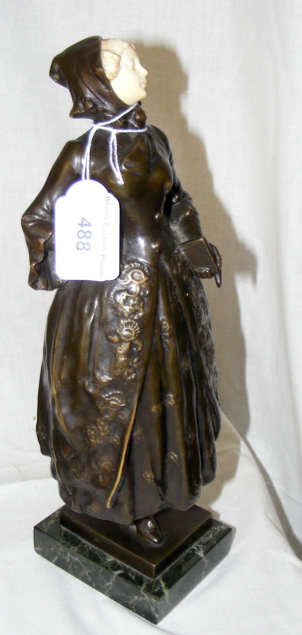 A bronze and ivory figure of a woman - signed F Lugerth - on marble base - 31cm high overall