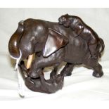 A finely cast bronze group of Elephant being attacked by two Tigers - 19cm high