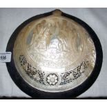 A 17cm diameter ornately carved and pierced with Nativity scene, flowers and foliage, Mother of