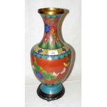 A Chinese cloisonne vase with flower design on carved wood stand - 42cm high overall