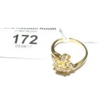 An 18ct yellow gold brilliant cut diamond cluster ring - .5 carat