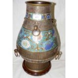 A large Japanese cloisonne/champleve vase with ring handles and chrysanthemum design on carved