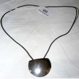 A Georg Jensen pendant designed by Hans Hansen, in original box