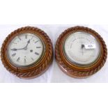A 19.5cm diameter aneroid barometer/thermometer in carved oak "rope twist" frame, together with