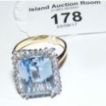 An 18ct gold blue topaz and diamond large rectangular ring