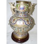 A Japanese cloisonne/champleve twin-handled vase with various designs on carved wood base - 34cm