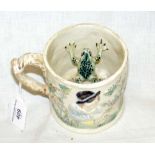 An antique "frog" mug - 10cms
