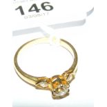 A three stone diamond ring in 18ct gold setting