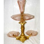 A 50cm high overall gilt metal and glass figural table centre, circa 1920