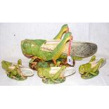 A 33cm Art Nouveau French majolica "Grasshopper" flower holder, with three matching 14cm smaller