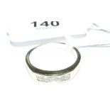 A five stone diamond ring marked 0.5 carat 750
