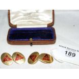 A pair of 18ct gold and enamel gent's cuff links with Royal Victoria Yacht Club burgees