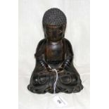 A 24cm high - Ming period - Chinese bronze seated Buddha