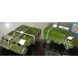 A pair of Dinky Toy 10 ton Army Trucks and two others