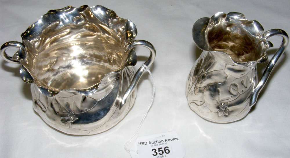 A Schiebler Japonesque sterling silver cream jug and matching sugar bowl impressed L.O.W. with