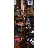 Bentwood coat/stick stand with revolving top